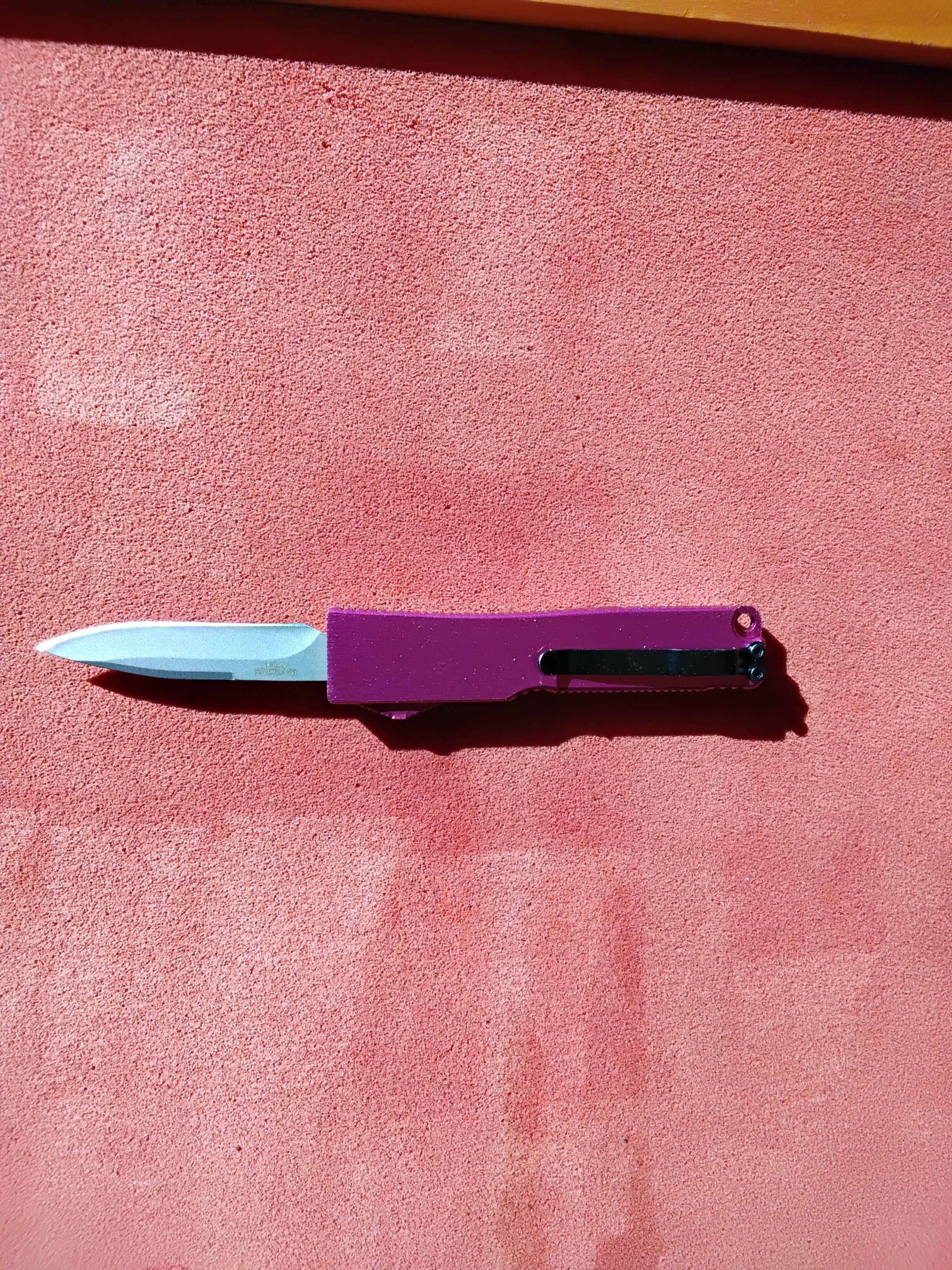 Pink Handle Front Loading Switchblade